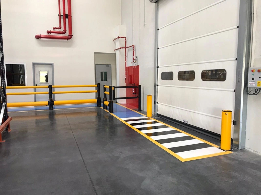 A-SAFE traffic barriers protecting vehicle and equipment routes in an industrial loading environment