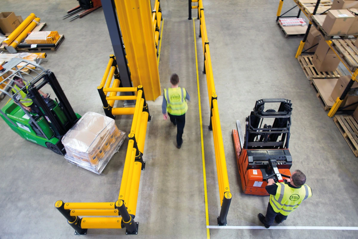 A-SAFE barriers creating protected pedestrian and forklift routes within a warehouse