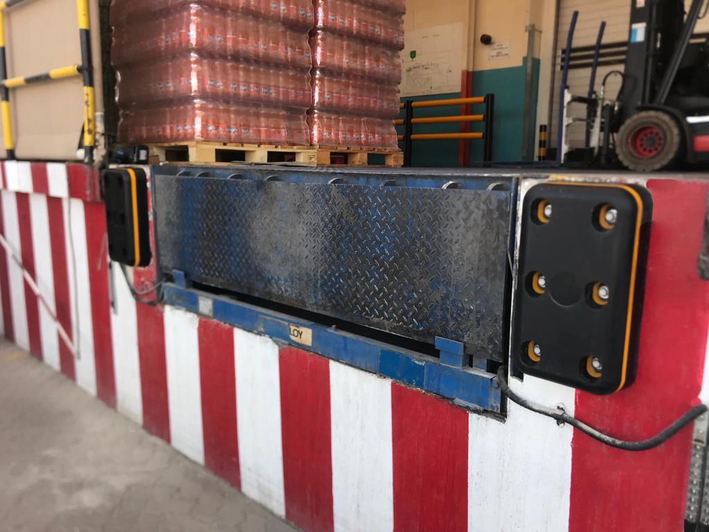 Close view of A-SAFE dock buffers installed on a loading bay