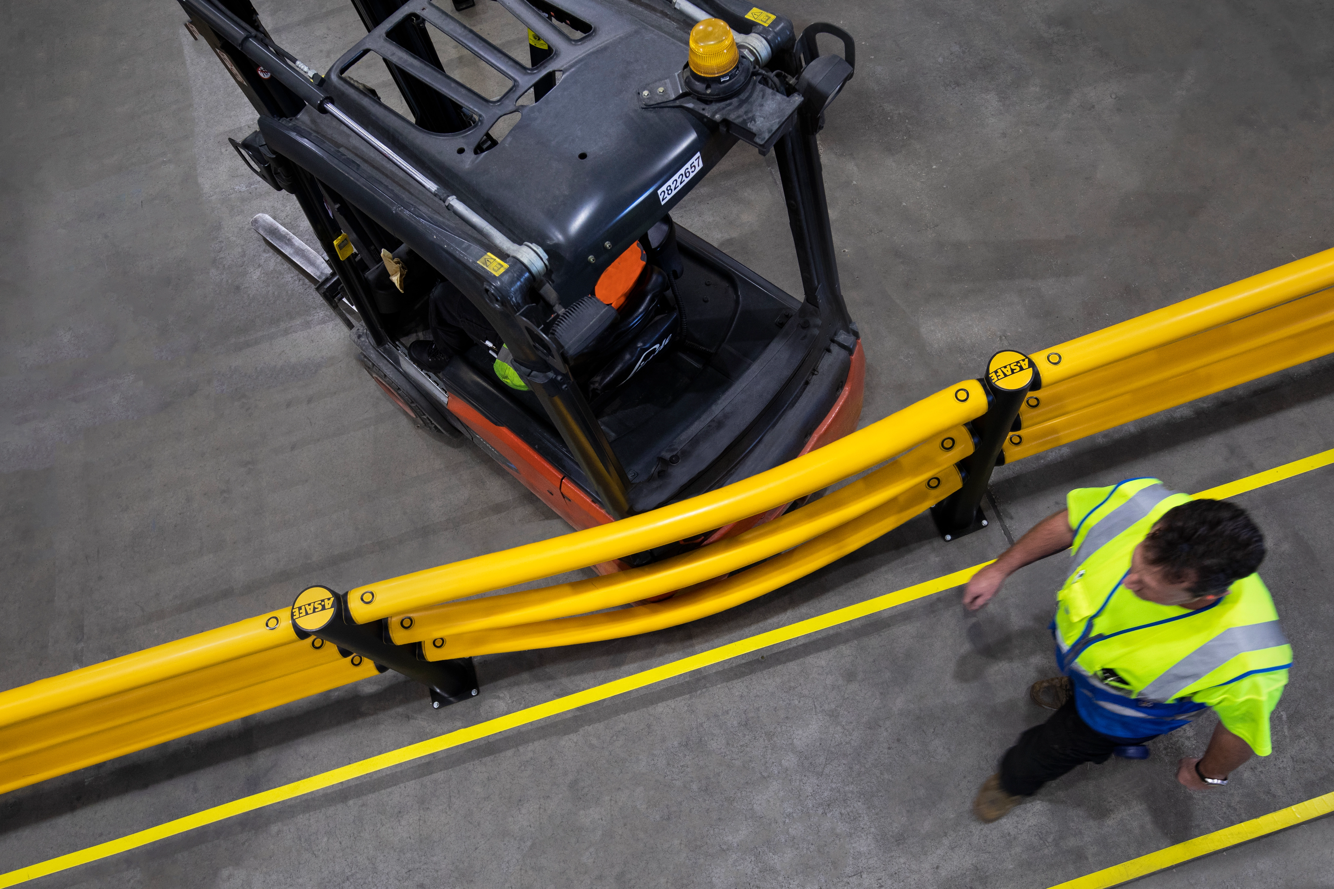 A-SAFE Engineered Polymer Barrier Flexing Under Forklift Impact