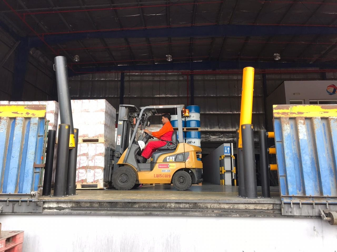 Forklift operating at a loading area protected by A-SAFE bollards