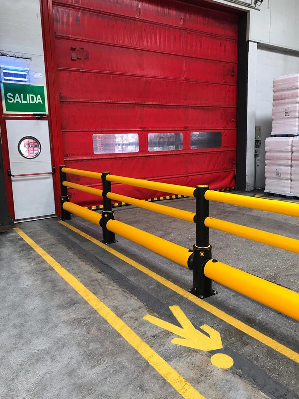A-SAFE barriers creating a protected pedestrian route beside an industrial doorway