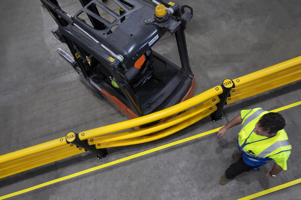 Vehicle impact test showing an A-SAFE pedestrian barrier flexing under contact