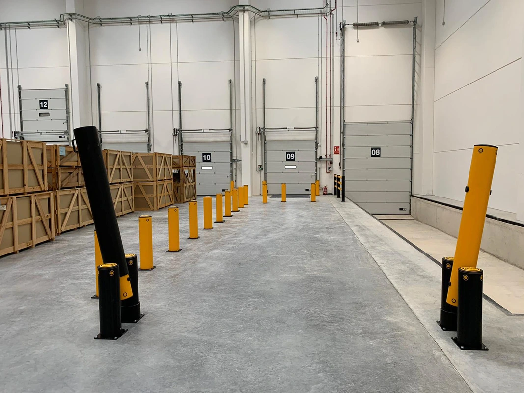 A-SAFE polymer bollards and dock protection installed near loading doors