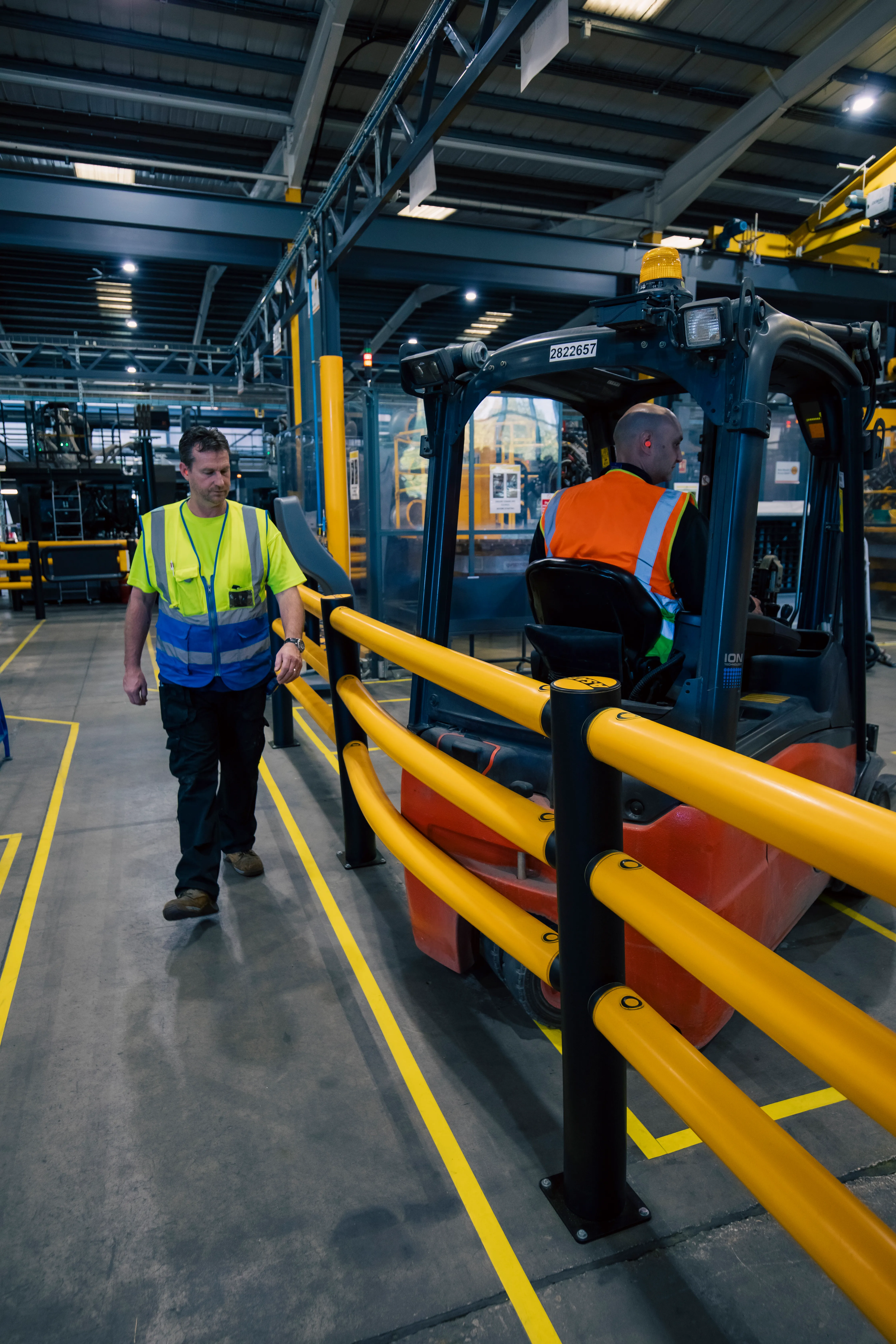A-SAFE barriers separating a pedestrian walkway from a vehicle route.
