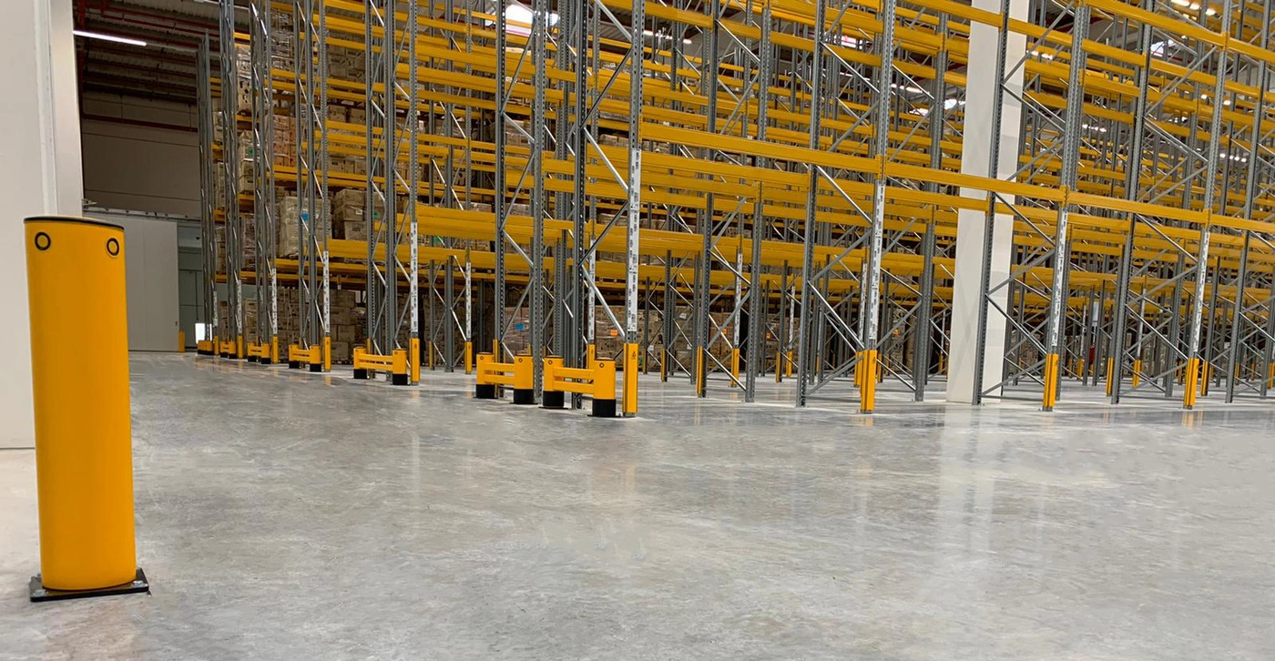 Industrial racking facility protected by A-SAFE impact protection systems.