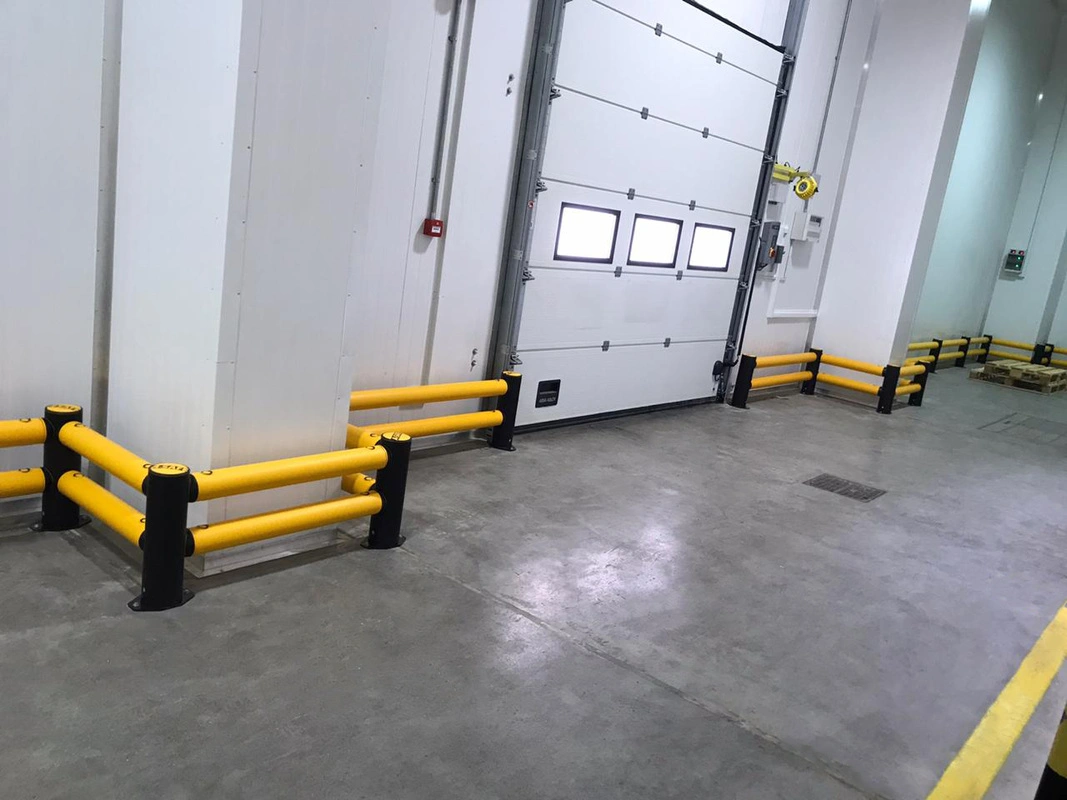 A-SAFE polymer barriers protecting industrial loading-door infrastructure